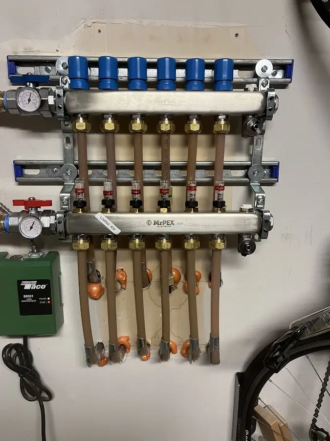 Plumber performing Water Heater Repair at a residential property in Bradley